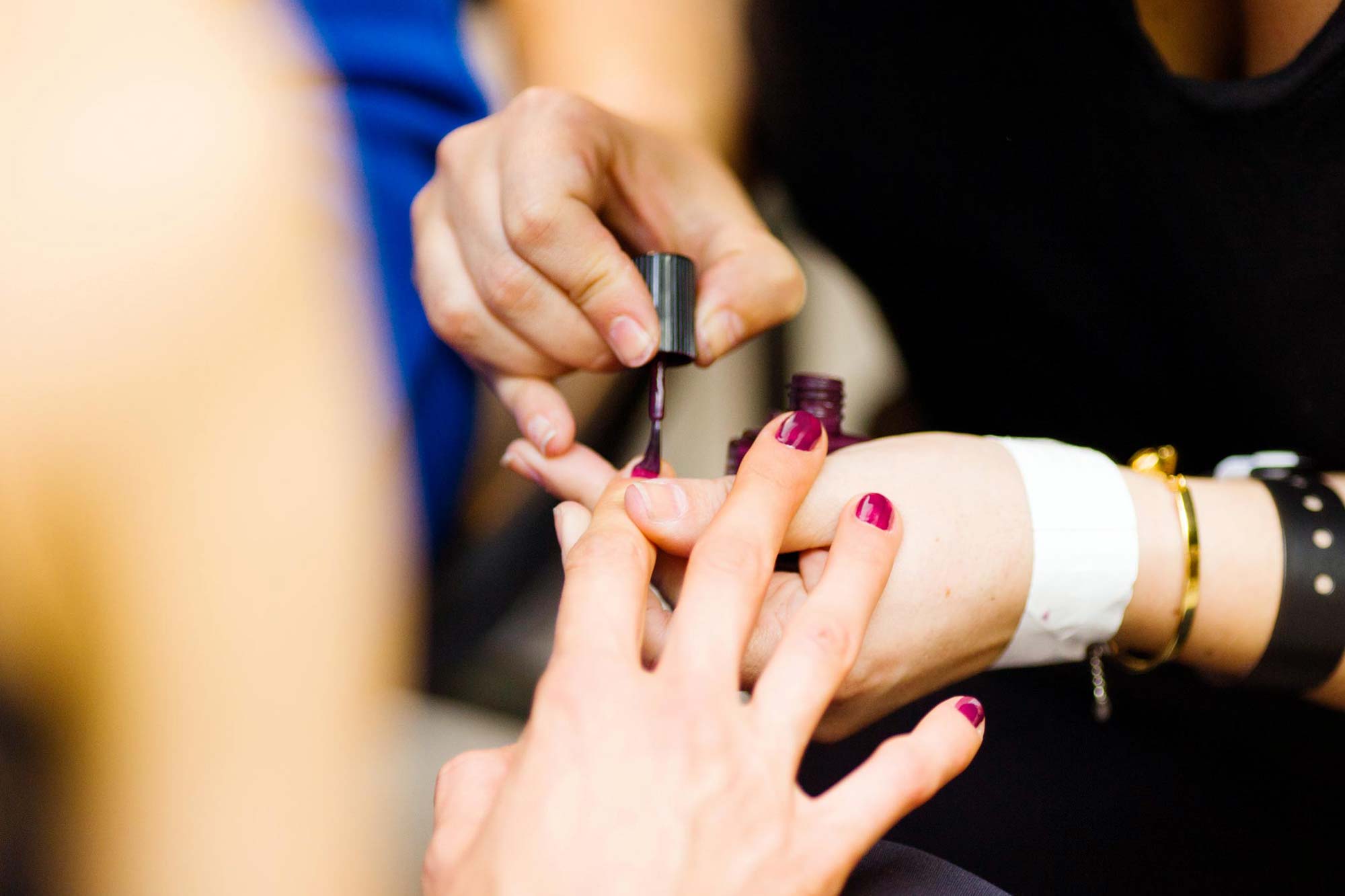 Woman getting her nails painted