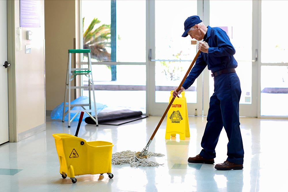 Janitor mopping
