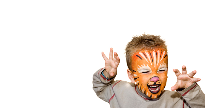 picture of a kid with their face painted.